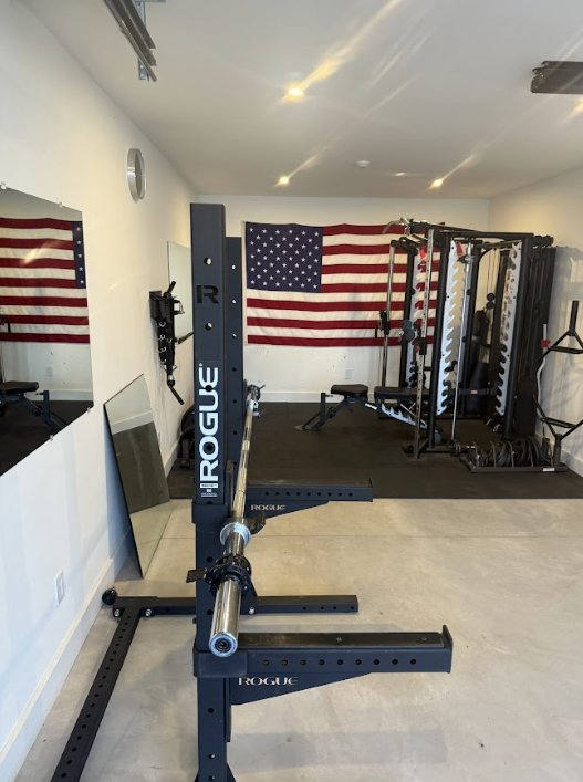 Professional home gym setup with equipment